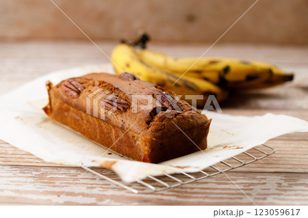 Banana bread loaf on wooden table. Banana bread loaf on wooden table. 123059617