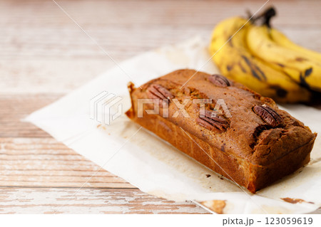 Banana bread loaf on wooden table. Banana bread loaf on wooden table. 123059619