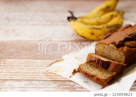 Banana bread loaf on wooden table. Banana bread loaf on wooden table. 123059621