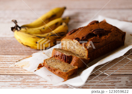 Banana bread loaf on wooden table. Banana bread loaf on wooden table. 123059622