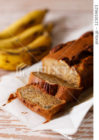 Banana bread loaf on wooden table. Banana bread loaf on wooden table. 123059623