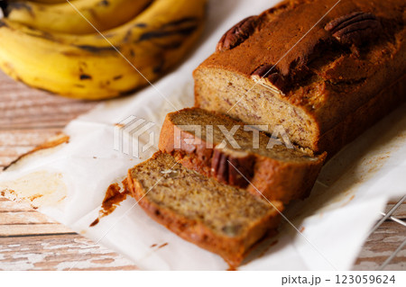 Banana bread loaf on wooden table. Banana bread loaf on wooden table. 123059624