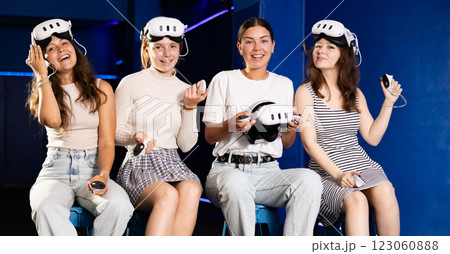 Female friends thrilled after virtual reality gaming experience 123060888