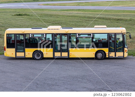 Yellow bus in the countryside 123062802