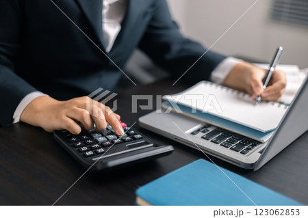 Finance bank tax expense accounting budget money businessman hand use calculator Financial calculate accountant close up calculator with graph chart write office desk Business expense analysis saving Finance bank tax expense accounting budget money businessman hand use calculator Financial calculate accountant close up calculator with graph chart write office desk Business expense analysis saving 123062853