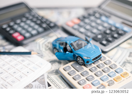 Finance bank tax expense accounting budget money businessman hand for Business expense analysis saving use car Financial calculate accountant close up calculator with graph chart write office desk 123063052