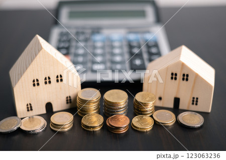 Finance bank tax expense accounting budget money businessman home for Business expense analysis saving use Financial calculate accountant close up calculator with graph chart hand write office desk 123063236