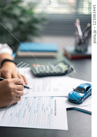 Finance bank tax expense accounting budget money businessman hand for Business expense analysis saving use car Financial calculate accountant close up calculator with graph chart write office desk 123063445