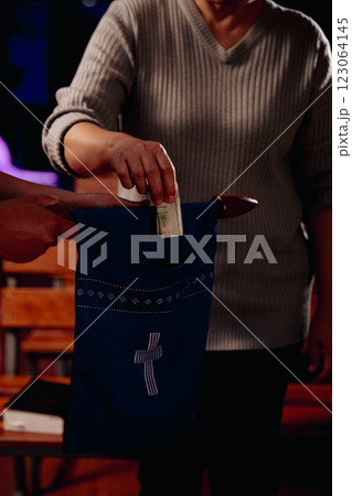 Close up christians hands pray to God with spiritual faith on holy bible in catholic church religion worship prayer ask god bless pray grace jesus believe Christianity religion prayer holy worship. 123064145