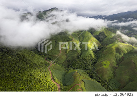 Top view Landscape of Morning Mist with Mountain Layer at north of Thailand. mountain ridge and clouds in rural jungle bush forest Top view Landscape of Morning Mist with Mountain Layer at north of Thailand. mountain ridge and clouds in rural jungle bush forest 123064922