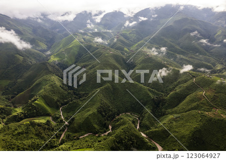 Top view Landscape of Morning Mist with Mountain Layer at north of Thailand. mountain ridge and clouds in rural jungle bush forest Top view Landscape of Morning Mist with Mountain Layer at north of Thailand. mountain ridge and clouds in rural jungle bush forest 123064927