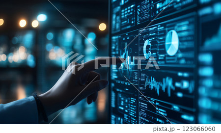 Businesswoman analyzing financial data on computer screen Businesswoman analyzing financial data on computer screen 123066060