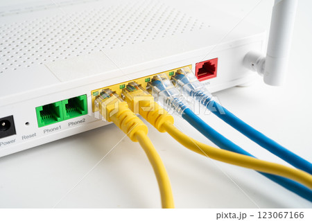 Ethernet cable with wireless router connect to internet service provider internet network. Ethernet cable with wireless router connect to internet service provider internet network. 123067166