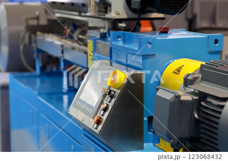close up of automated plastic extruder machine close up of automated plastic extruder machine 123068432