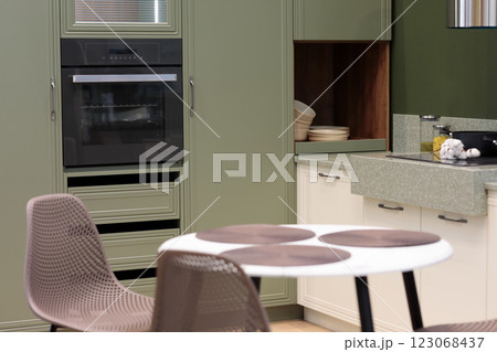 domestic kitchen with dining table and chairs domestic kitchen with dining table and chairs 123068437