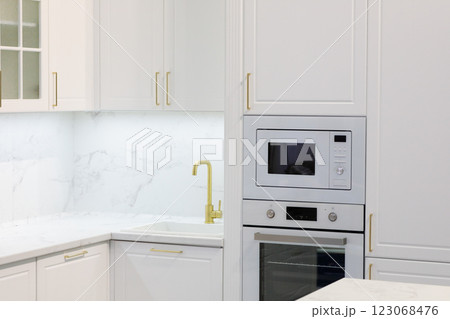 modern kitchen interior with white cabinets 123068476