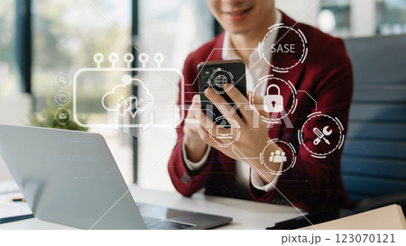 Hand touching Secure Access Service Edge icon on smartphone virtual screen background, password, network, framework and support technology in office. SASE secure access service edge concept. Hand touching Secure Access Service Edge icon on smartphone virtual screen background, password, network, framework and support technology in office. SASE secure access service edge concept. 123070121