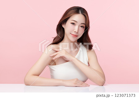 Beautiful young asian woman with clean fresh skin on pink background, Face care, Facial treatment, Cosmetology, beauty and spa, Asian women portrait. 123071373