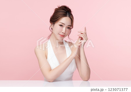 Beautiful young asian woman with clean fresh skin on pink background, Face care, Facial treatment, Cosmetology, beauty and spa, Asian women portrait. Beautiful young asian woman with clean fresh skin on pink background, Face care, Facial treatment, Cosmetology, beauty and spa, Asian women portrait. 123071377