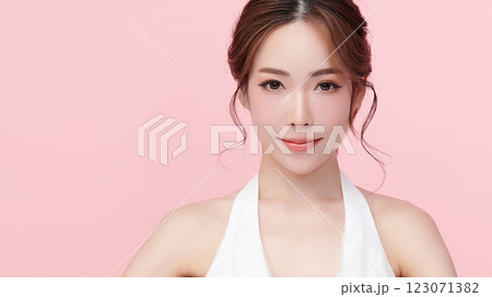 Beautiful young asian woman with clean fresh skin on pink background, Face care, Facial treatment, Cosmetology, beauty and spa, Asian women portrait. Beautiful young asian woman with clean fresh skin on pink background, Face care, Facial treatment, Cosmetology, beauty and spa, Asian women portrait. 123071382