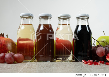 Apple, pomegranate, white wine and balsamic vinegars among fruits Apple, pomegranate, white wine and balsamic vinegars among fruits 123071931