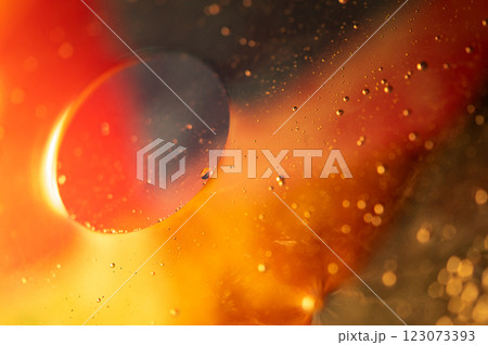 Oil in water, abstract background in yellow and red color tones Oil in water, abstract background in yellow and red color tones 123073393