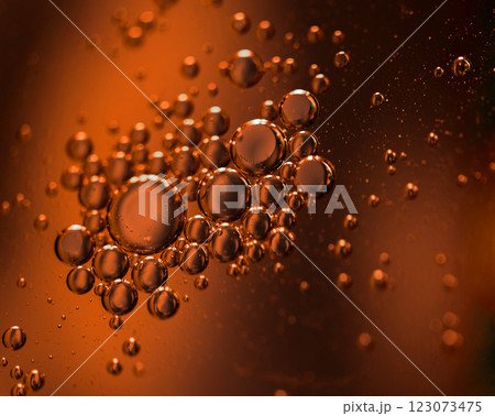 Oil in water, abstract background in golden tones Oil in water, abstract background in golden tones 123073475