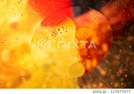 Oil in water, abstract background in yellow and red color tones Oil in water, abstract background in yellow and red color tones 123073477