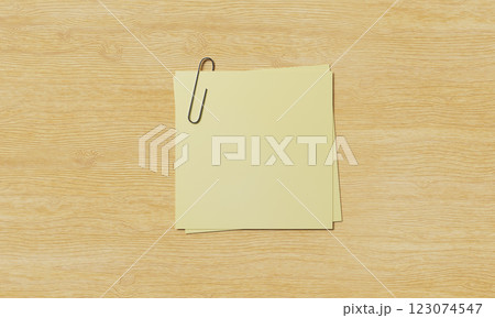 Yellow Sticky Paper with Paper Clip on wood background. 3D Rendering 123074547