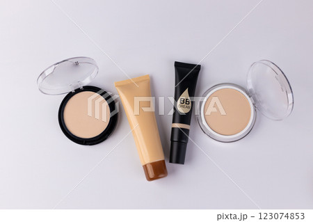 A Collection of Different Makeup Products Including BB Cream, Foundation, and Powder for a Flawless Finish and Beautiful Skin Tone 123074853