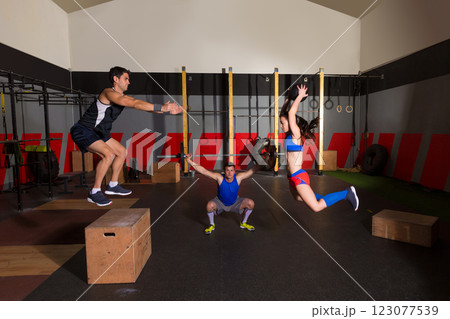 gym group workout barbells slam balls and jump 123077539