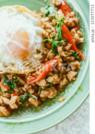 Stir Fried Basil Chicken , Fried Egg with Rice Stir Fried Basil Chicken , Fried Egg with Rice 123077713
