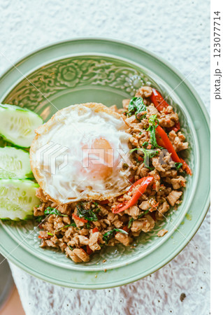 Stir Fried Basil Chicken , Fried Egg with Rice 123077714