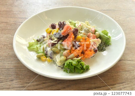 crab stick and vegetable topping shrimp egg salad on plate crab stick and vegetable topping shrimp egg salad on plate 123077743