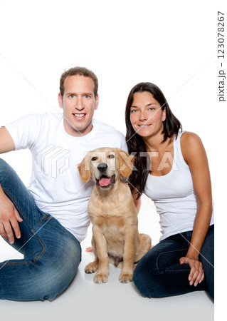 couple in love puppy dog golden retriever 123078267