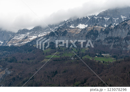 View of mountain peaks on the shores of Lake Walensee in Switzerland 123078296