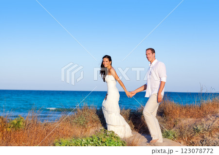 couple in love in the beach on Mediterranean couple in love in the beach on Mediterranean 123078772