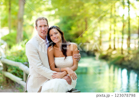 couple of lovers in love in park river hug couple of lovers in love in park river hug 123078798