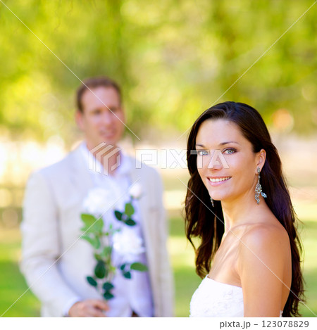 couple just married with man holding flowers couple just married with man holding flowers 123078829