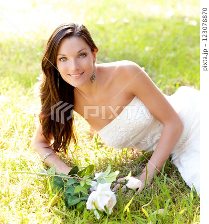 bride woman lying in park grass 123078870