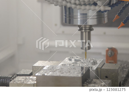 The CNC milling machine cutting  mold part by solid ball nose end mill tool. 123081275
