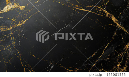 A black and gold background with a gold and black swirl pattern. The gold swirls are prominent in the foreground, while the black background is in the background 123081553