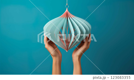 Hand holding a womb shape made of paper,  Awareness of uterine disease, cancer , Generate AI 123083355