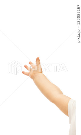 Small hand reaching outward with open fingers against white studio background. Small hand reaching outward with open fingers against white studio background. 123085167