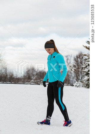 Young lady doing workout in park. Young lady doing workout in park. 123085538