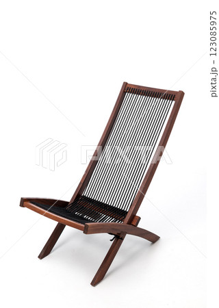 Modern wooden lounge chair with black rope seat, isolated on a white background. Stylish furniture for interiors and catalogs 123085975