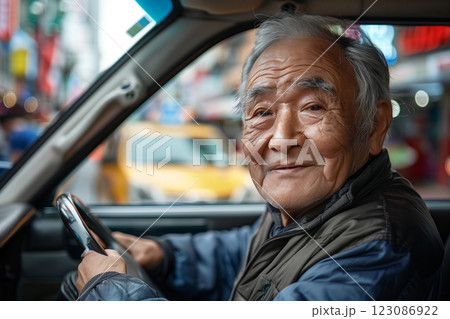 A smiling elderly man sitting in a car, showcasing warmth and community spirit. 123086922