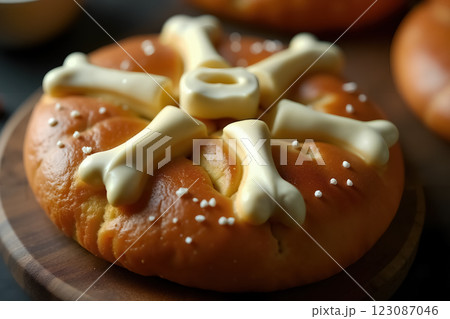 Traditional Dia de Muertos Pan de muerto Decorated with Edible Bones and Sprinkles Traditional Dia de Muertos Pan de muerto Decorated with Edible Bones and Sprinkles 123087046