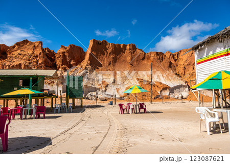 Famous barracas, bars and restaurants at Canoa Quebrada Beach, Brazil 123087621