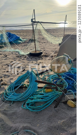 Fishing equipment, boats, nets on the Atlantic coast in Portugal. Fishing trash on the ocean beach. Fishing equipment, boats, nets on the Atlantic coast in Portugal. Fishing trash on the ocean beach. 123089181